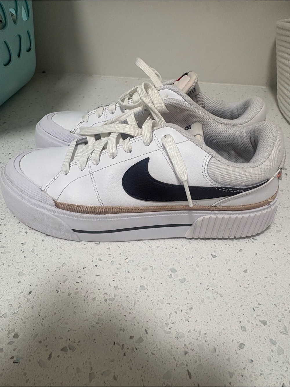 Nike White Sneakers with Black Swoosh and Beige Trim